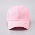 Close-up of pink cotton baseball cap with silver rhinestone LOVE letters on the front - Adjustable / Pink - Small Rhinestone LOVE