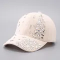 Close-up of beige corduroy baseball cap with sparkling rhinestones and crystal details - Beige - Random Hot Stamping Rhinestones