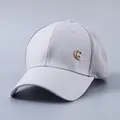 Detail view of breathable grey mesh baseball cap with crystal embellished G logo on side - Adjustable / Gray