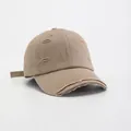 Vintage distressed khaki cotton baseball cap with ripped details and curved brim - Khaki