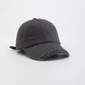 Detail of distressed dark grey baseball cap showing vintage frayed edges and cotton texture - Gray