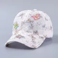 Close-up of white lace baseball cap featuring 3D butterfly patches and sparkling rhinestones - Adjustable / Rhinestone 3D Yellow Butterfly