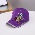 Casquette en coton violet avec grand papillon en strass colorés et bordure en cristaux - Violet (Coton)