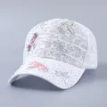 Close-up of white lace baseball cap with colorful 3D dragonfly patches and rhinestones - Adjustable / Rhinestone 3D Dragonfly White
