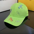 Neon green baseball cap featuring sparkling rhinestone dragonfly patterns and accents - Adjustable / 3D Dragonfly - Neon Green