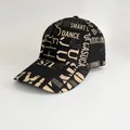 Detail of black baseball cap featuring beige letter prints like SMART and DANCE - Adjustable / Black Large Letter Printing