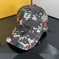 Reflective graffiti camouflage baseball cap featuring vibrant red, yellow and grey patterns - Adjustable / Bronzing Camouflage - Black