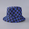 Reversible bucket hat featuring blue and black checkerboard pattern with smiley faces - Blue Black Checkerboard Smiley (31#)