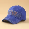 Detailed view of shimmering rhinestone LOVE logo on blue cotton denim baseball cap - Adjustable / Love-Blue
