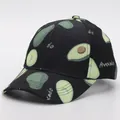 Close-up of fabric texture and avocado print patterns on a black baseball cap - Adjustable / Avocado 4 (Black Base)