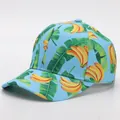 Detail of blue cotton baseball cap with tropical yellow banana and green leaf print - Adjustable / Banana 2 (Sky Blue Base)