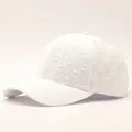 Detail shot of white seersucker baseball cap showing textured bubble fabric and curved brim - Adjustable / Lace Knot-White