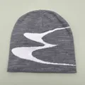 Dark grey knitted beanie with white wave pattern for winter streetwear and warmth - One Size / Gray White Jacquard