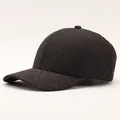 Detail of black plaid baseball cap featuring embroidered floral daisy textures - Little Sun / Black