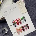 Detail of handmade Christmas press-on nails with 3D reindeer and snowflake art patterns - 1217-Christmas Gift
