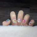 Uñas postizas 3D de Navidad con Papá Noel, muñeco de nieve y árbol sobre brillo plata - Extra Pequeño (XS)