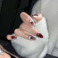 Deep red cat eye press-on nails with silver foil textures and gemstone accents - XS / Short Coffin Carved Style (1246)