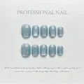 Short round ice blue cat eye press-on nails with holographic laser glitter finish - Cool Light Blue (1020)