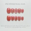 Short round cat eye press-on nails in hawthorn pink-orange shimmer finish, 10 piece set - XS / Transparent Pink Orange (1014)