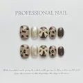 Set di unghie finte fatte a mano con stampa leopardata e fiocchi 3D beige decorati - Extra Piccolo (XS) / Leopardo Caffè Oro