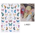 Vue macro des autocollants à ongles papillon holographiques L-N021 effet laser - Style Fée des Fleurs Papillon Éclatant(L-N021)
