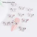 Detailed view of 10-piece silvery pink butterfly nail art charms with crystal rhinestones - Silver Tone Pink