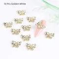 Golden butterfly nail charms with clear crystals in a 10-piece set for luxury nail art - Gold With White Rhinestones