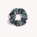 Detailed view of British style plaid scrunchie with high elasticity and green tartan fabric - Forest Green Plaid