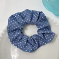 Blue ocean style scrunchie with white polka dots on a white ceramic plate - Blue White Dots