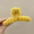 Bright yellow plush claw clip for hair featuring soft faux fur texture and cross design - Ginger Yellow