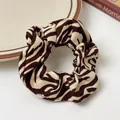 Brown zebra print oversized scrunchie made of soft fabric for daily hair styling - Zebra Brown