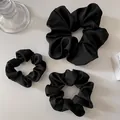 Set of three black satin scrunchies in various sizes with a premium matte texture - Large Medium And Small Sizes Combination / Black Set