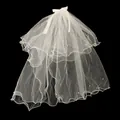 Detail of white double-layer bridal veil with silk bow and scattered pearls on black background - Double Layer Pearl Without Light
