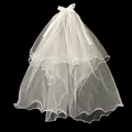 Detail of white multi-layer bridal veil with bow clip and wavy edges on black backdrop - Double Layer Plain Without Light