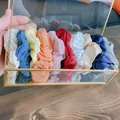 Set di dieci elastici colorati in varie tonalità pastello in una scatola di vetro - Mille Spiriti