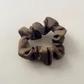 Elegant dark brown satin scrunchie with smooth texture and shiny fabric finish - Camel