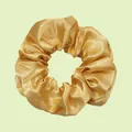 Elastic satin scrunchie in golden champagne color featuring a silky pleated texture - Gold Yellow