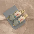Detailopname van schattige wolk- en glitterster haarspelden op displaykaart - Blauwe Wolk en Ster Clip