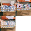 Set di elastici per capelli floreali e a scacchi in un elegante cofanetto di vetro dorato - Assortimento Grani e Blu