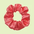 Coral pink satin scrunchie with elegant pleated fabric and silky pearl finish - Coral