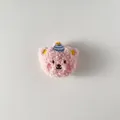 Detailed view of plush pink teddy bear head with a blue party hat for DIY accessories - Back Opening Style (DIY Accessory) / Pink Teddy Plush Bear