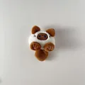 Detailed close-up of a plush Siamese cat pendant featuring soft white fur and brown ears - Back Opening Style / Brown