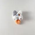 Close-up of white plush cat charm with gray ear and orange base for DIY accessories - Back Opening Style / Grey Orange Gradient