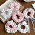 Set di elastici per capelli in pizzo rosa e bianco con motivi floreali e fiocchi - Sogno Dolce