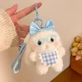 Close-up of white plush bunny keychain with blue bow, glasses, and woven strap accessory - Blue Apron Bunny