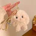 Close-up of a pink plush bunny keychain with a plaid hat and a pearl bow accessory - Pearl Bowknot Style