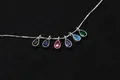 Macro detail of S925 silver necklace with six colorful teardrop zircon pendants - Teardrop-Black
