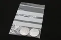 Transparante PE-gripzak met ritssluiting en drie witte schrijfvlakken voor labeling - 9cmx6cm