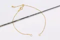 Macro-opname van goudkleurige boxketting met verstelbare kogel en ronde veerringsluiting - Zilver Geelgoud Vergulde Verstelbare Armband Ketting