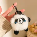 Détail du porte-clés peluche panda mignon avec fourrure blanche et clip noir - Tête de Panda Noir et Blanc avec Clochette (F-4568)